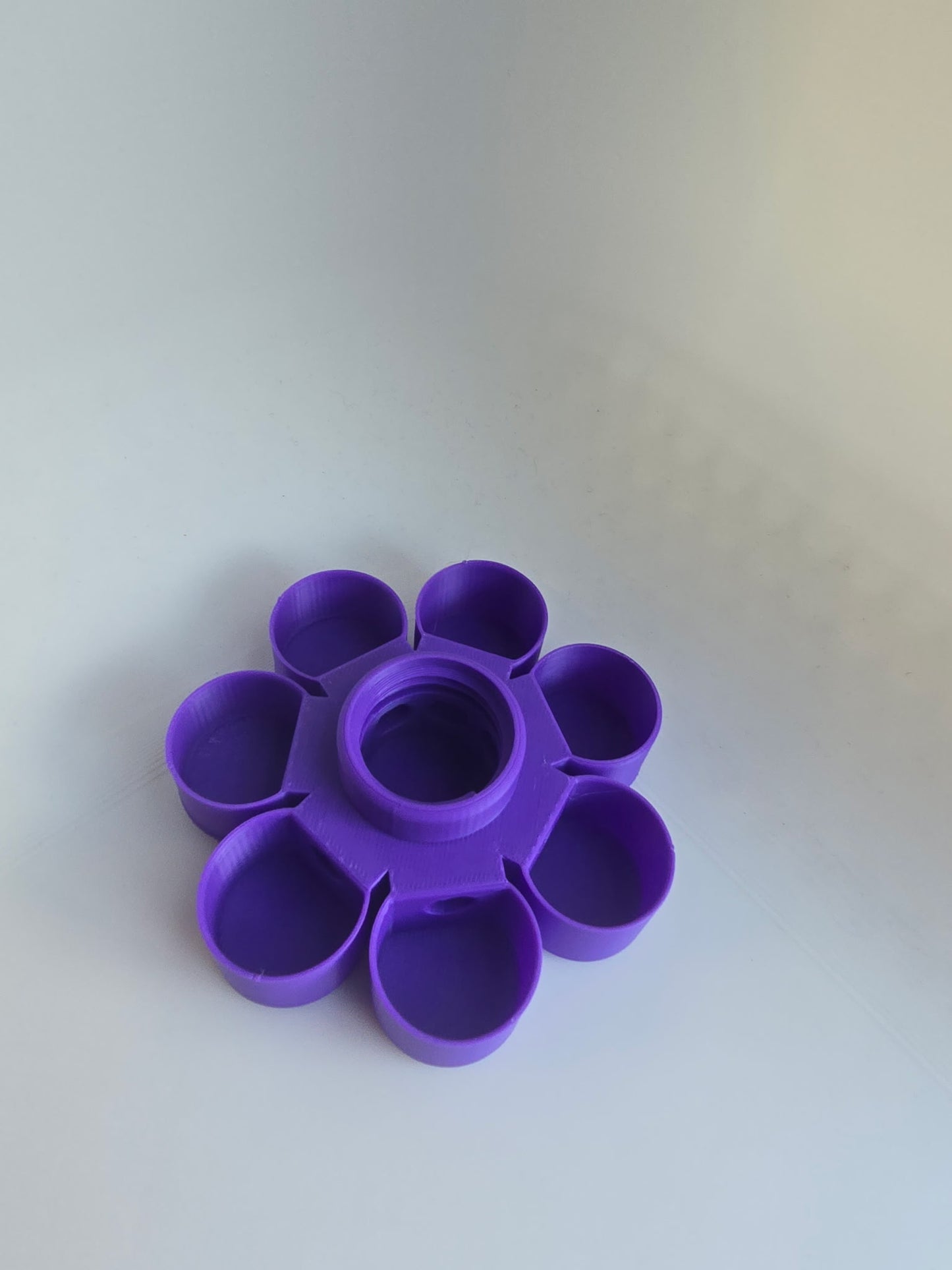 HoneyBunny3D Drinker Base for chicks and quail, durable plastic water feeder with multiple outlet ports for poultry hydration.