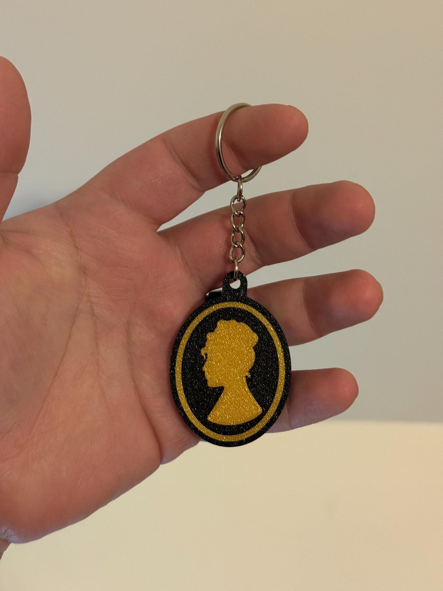 Lady Whistledown charm keychain by HoneyBunny3D featuring a detailed character design on a silver-tone metal keyring.
