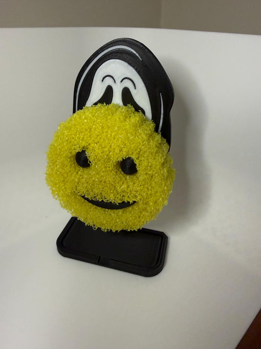Ghost Face Scrub Daddy holder by HoneyBunny3D, featuring a spooky ghost face design with a place to hold cleaning sponges.