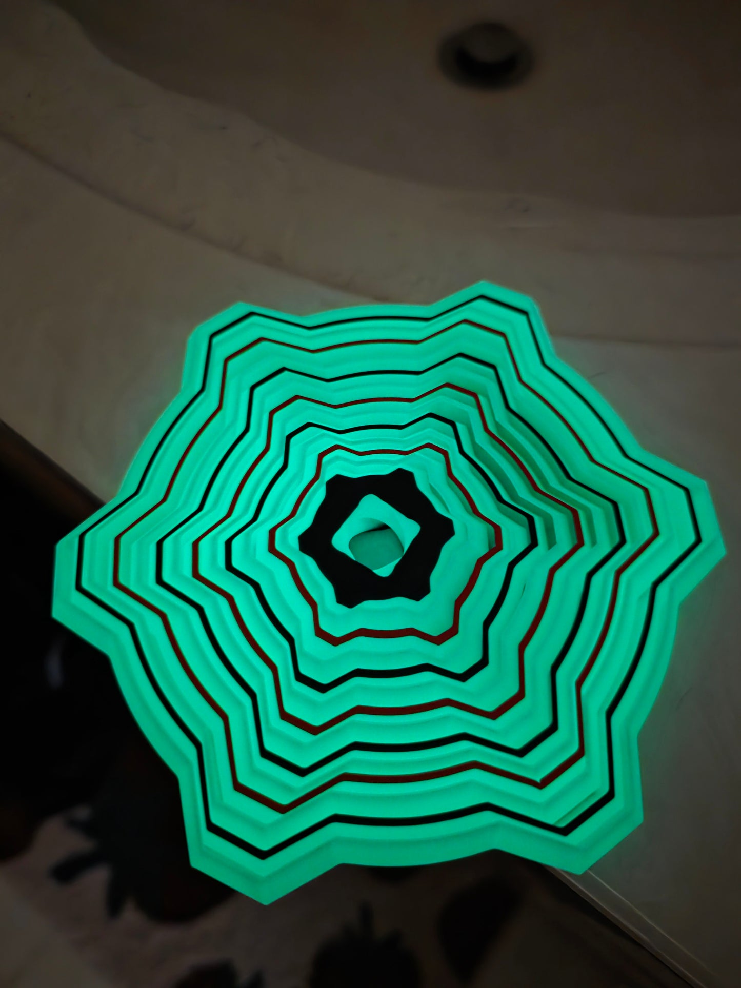 Glow-in-the-dark Lightsaber Fidget toy by HoneyBunny3D, featuring a sleek design and bright, luminous blade for fun and stress relief.