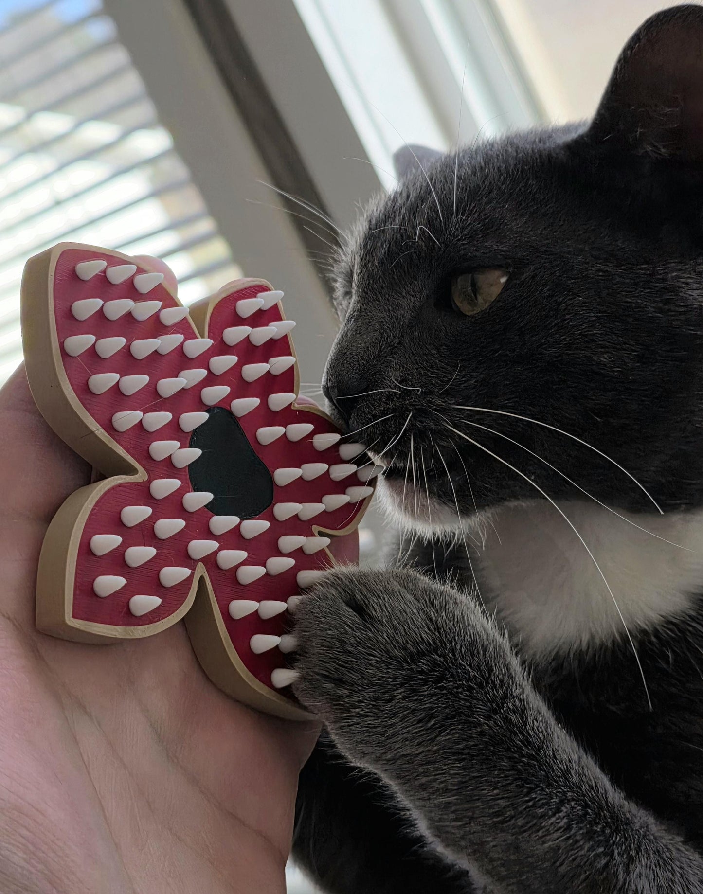 HoneyBunny3D Demogorgon pet brush showing a detailed, ergonomic handle and soft bristles for gentle grooming.
