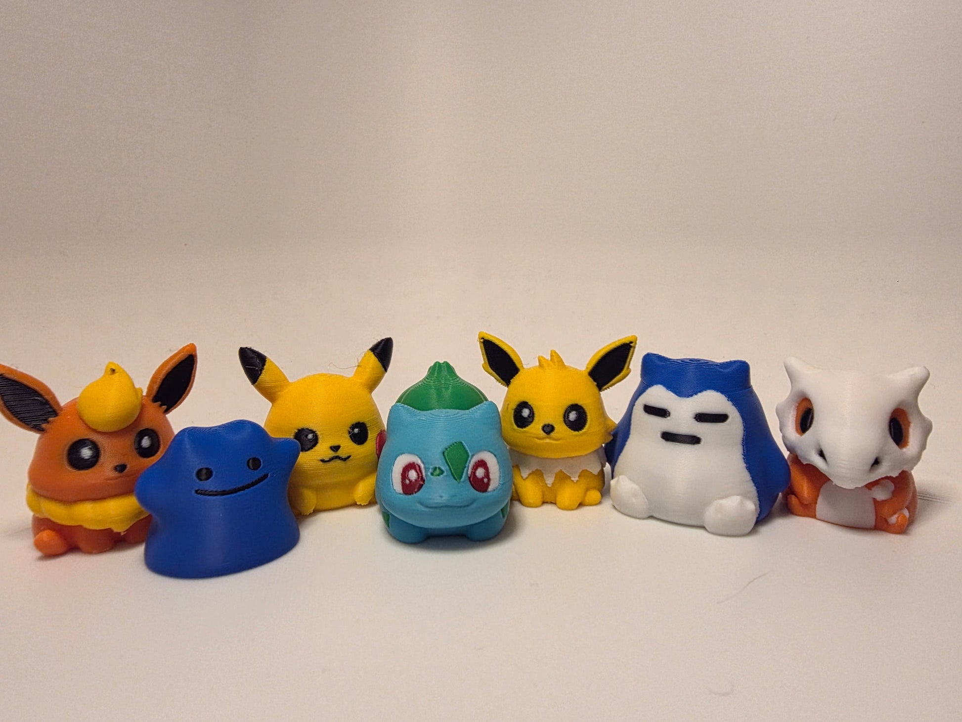 MiniMon plush toy by HoneyBunny3D, featuring soft fabric and cute design, perfect for cuddling and display.