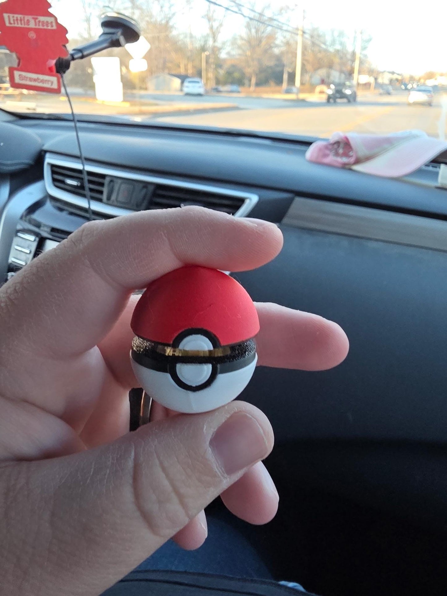 HoneyBunny3D PokeBall clicker fidget keychain charm with a spherical design and compact size, ideal for fidgeting and key organization.