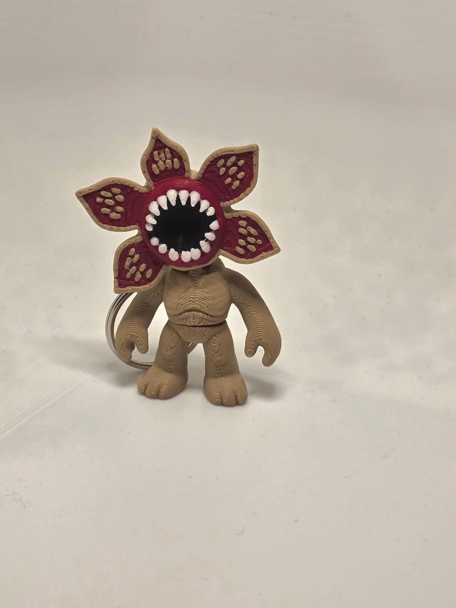 HoneyBunny3D Demogorgon keychain charm featuring a detailed, spooky monster design on a metal keyring accessory.
