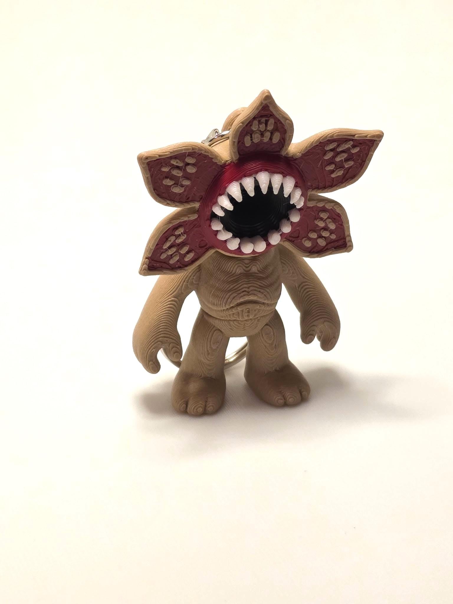 HoneyBunny3D Demogorgon keychain charm showing a detailed, playful Demogorgon figure as a colorful accessory.