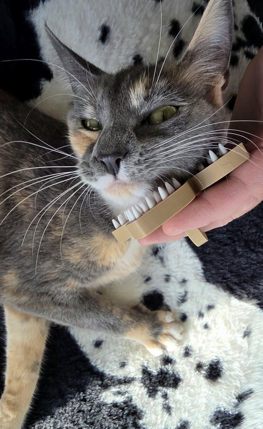 HoneyBunny3D Demogorgon Pet Brush with ergonomic handle and soft bristles for gentle grooming of pets.