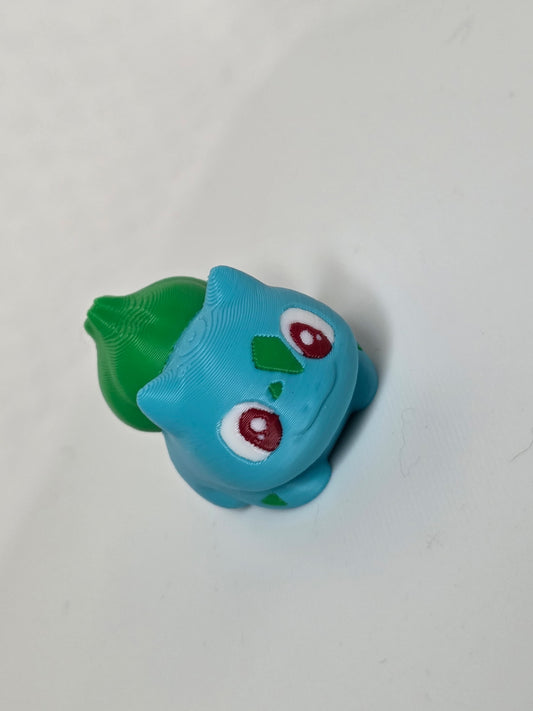 MiniMon by HoneyBunny3D, a cute 3D printed mini plush toy with detailed features and vibrant colors.