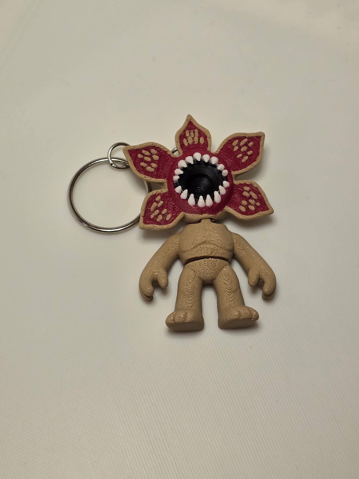 HoneyBunny3D Demogorgon keychain charm featuring a detailed, miniature Demogorgon figure for bags or keys.