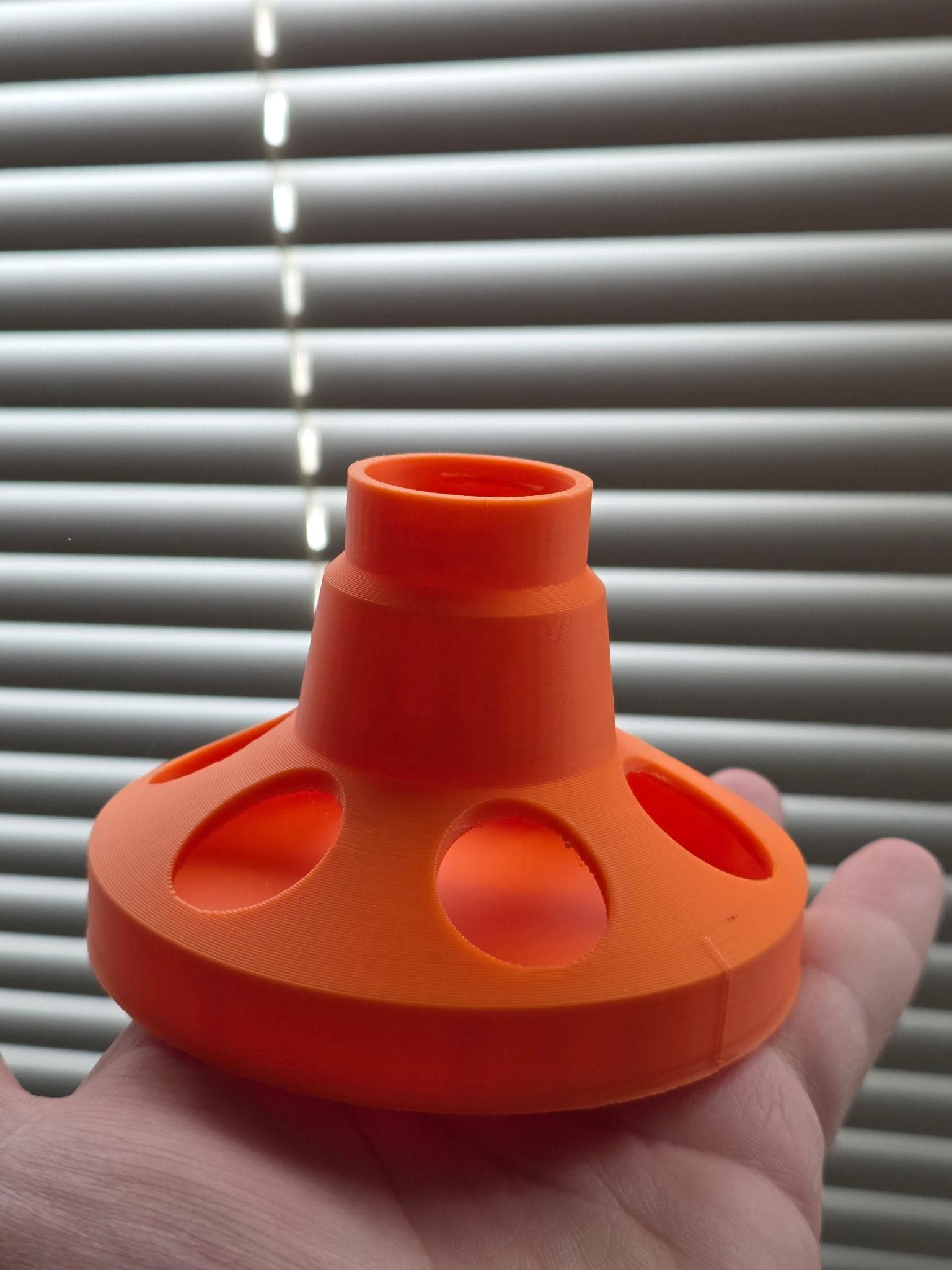 HoneyBunny3D chick and quail feeder base fitting soda bottles, shown attached to a clear plastic bottle for poultry feeding.