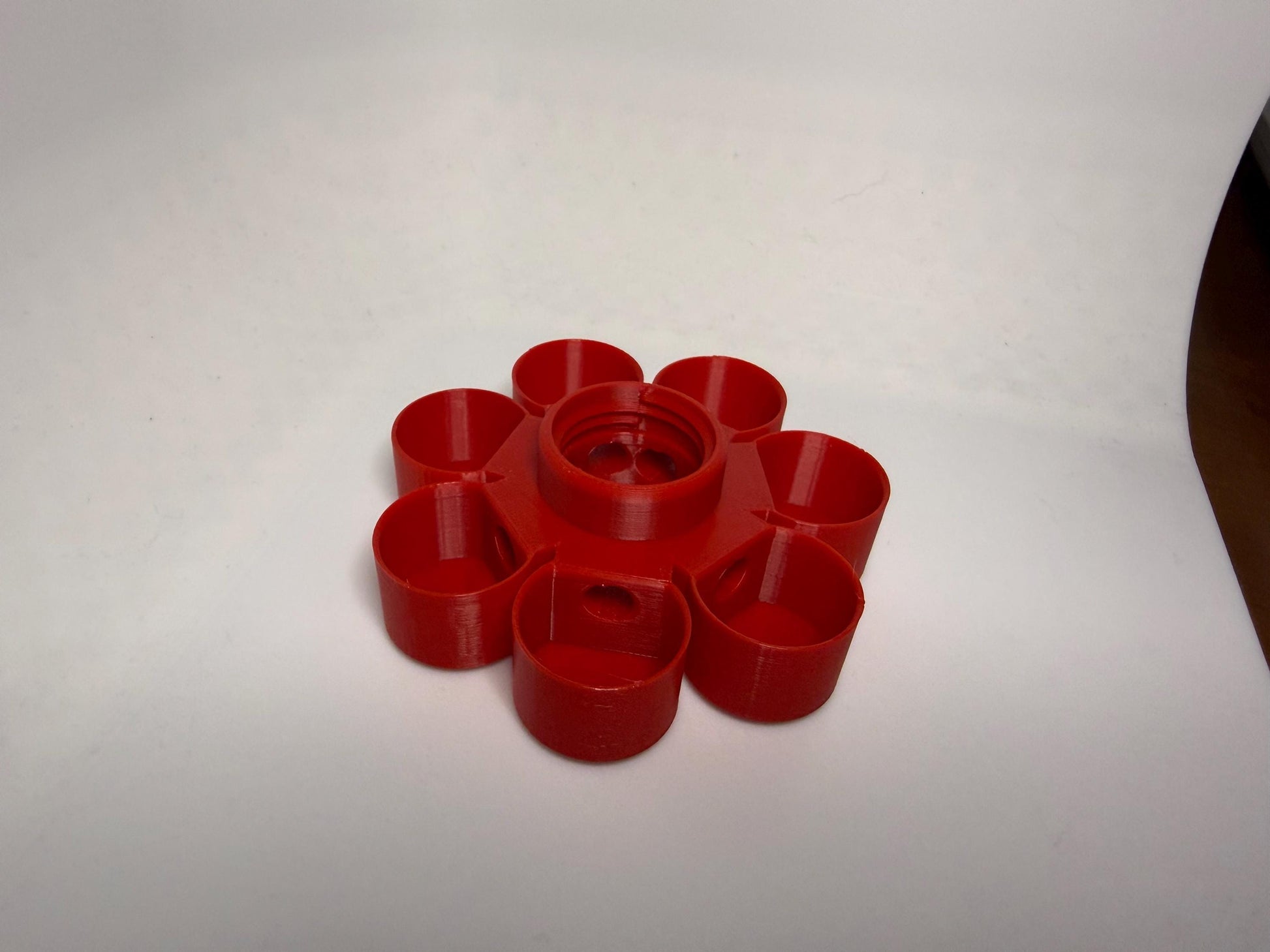 HoneyBunny3D Drinker Base for chicks and quail, durable plastic water feeder with multiple outlets for small poultry.