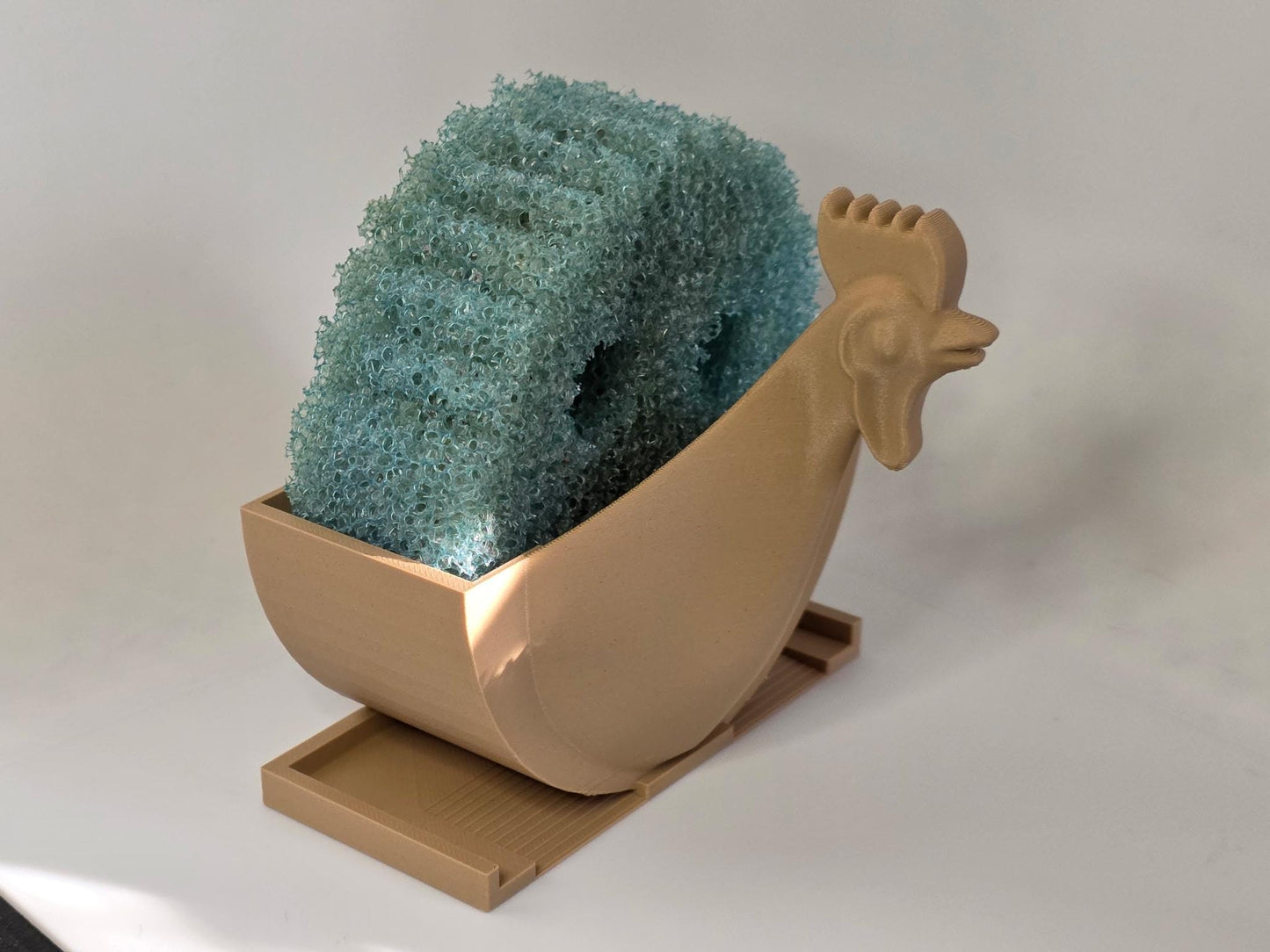 HoneyBunny3D Chicken Scrub Daddy holder with drain, a colorful kitchen gadget for organizing cleaning sponges and scrubbers.