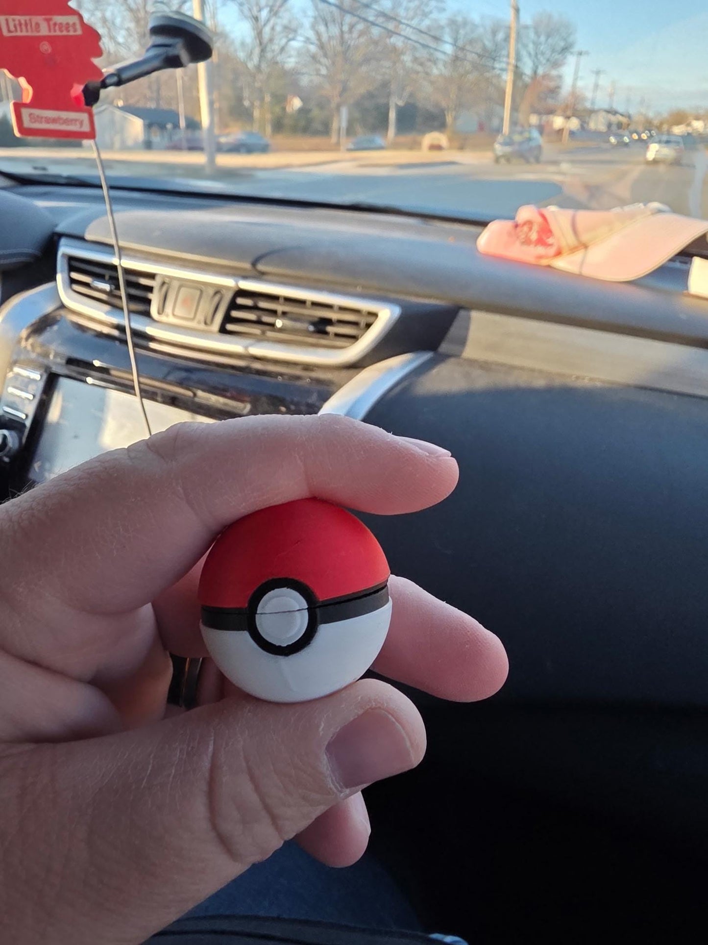 HoneyBunny3D PokeBall clicker fidget keychain charm with realistic Pokemon-inspired design on a keyring.