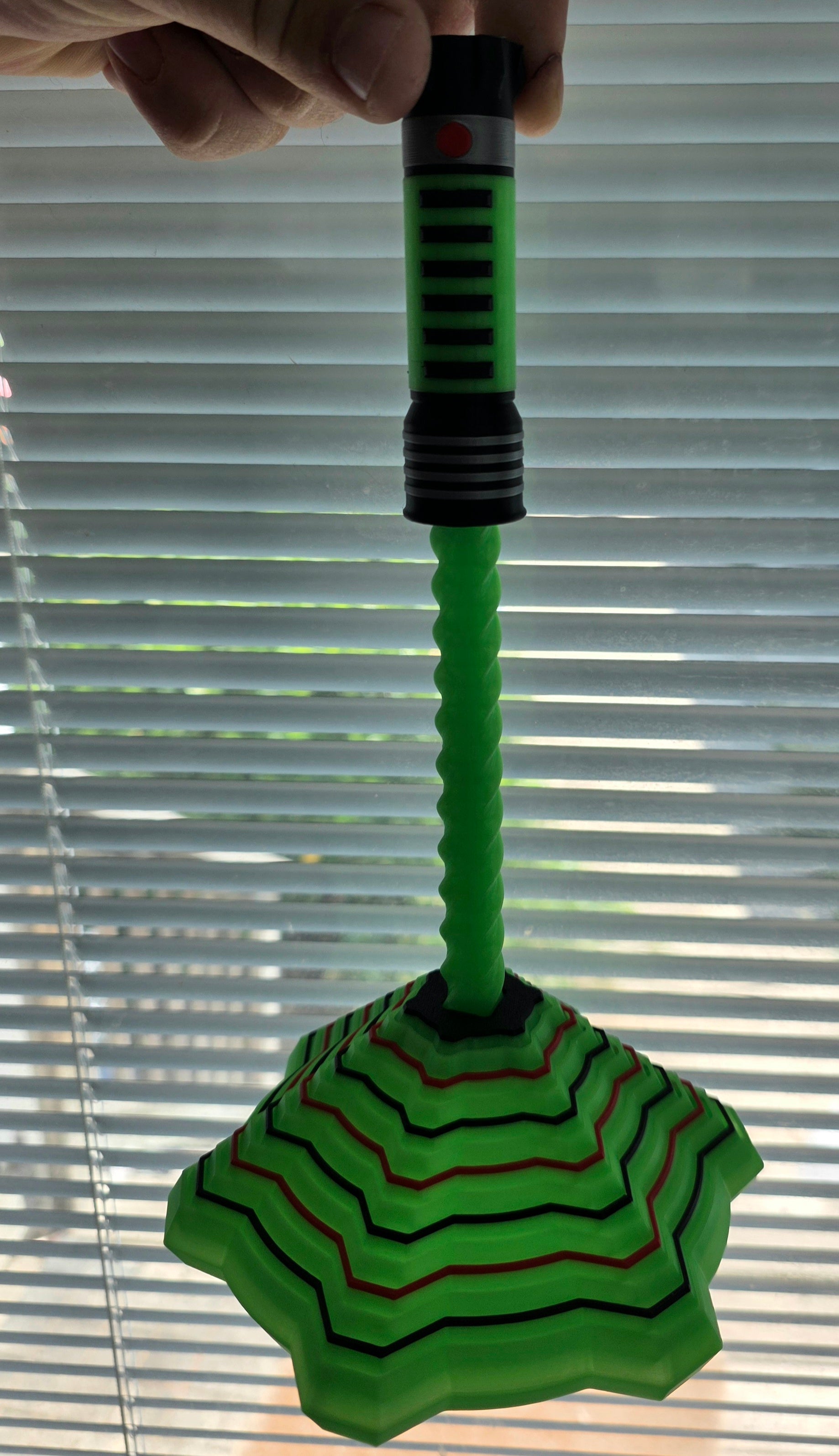 Glow-in-the-dark Lightsaber Fidget toy by HoneyBunny3D with vibrant LED colors and detailed hilt design for fun, tactile play.