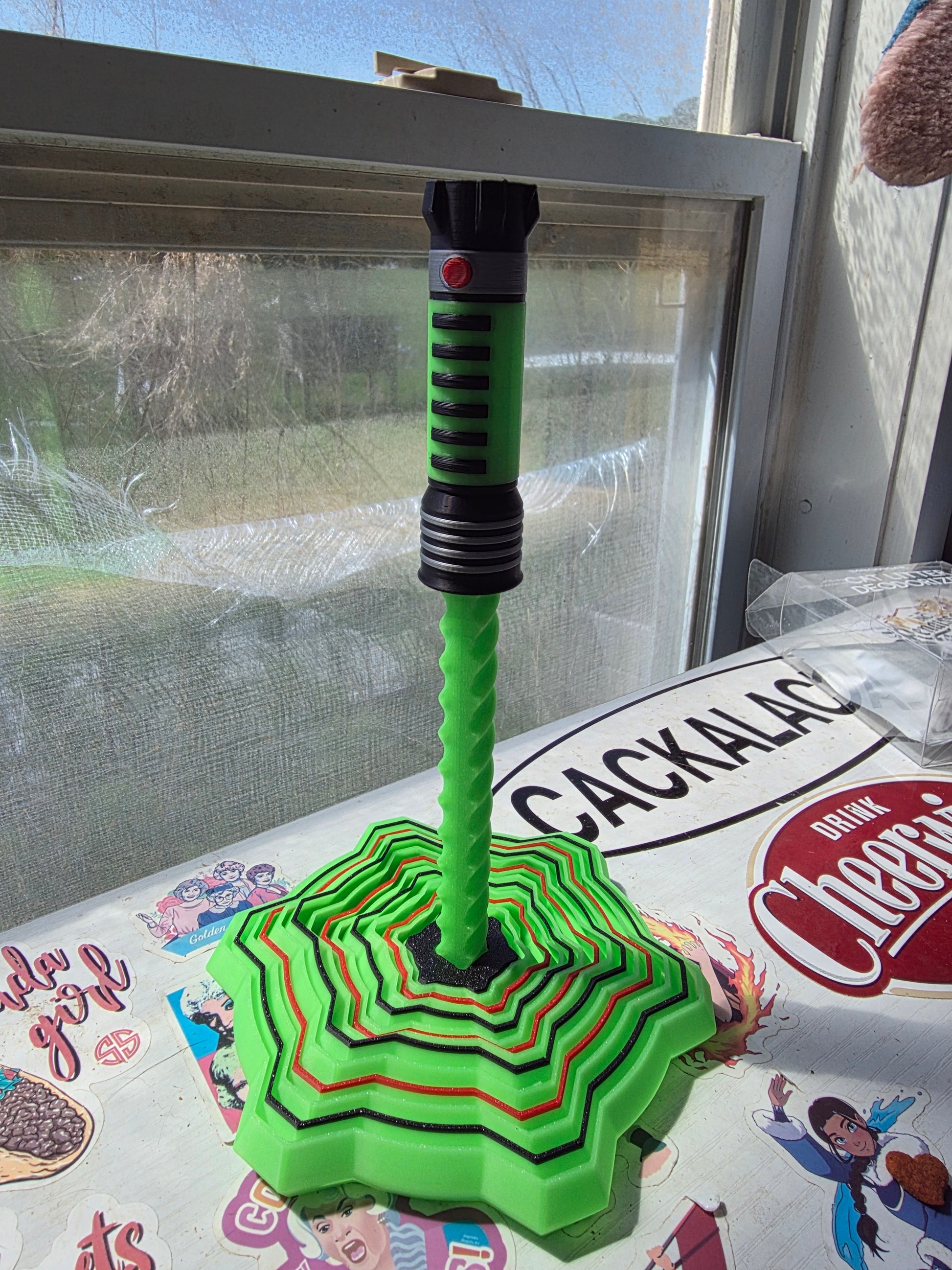 Glow-in-the-dark Lightsaber fidget toy by HoneyBunny3D, featuring a realistic lightsaber design perfect for stress relief and play.